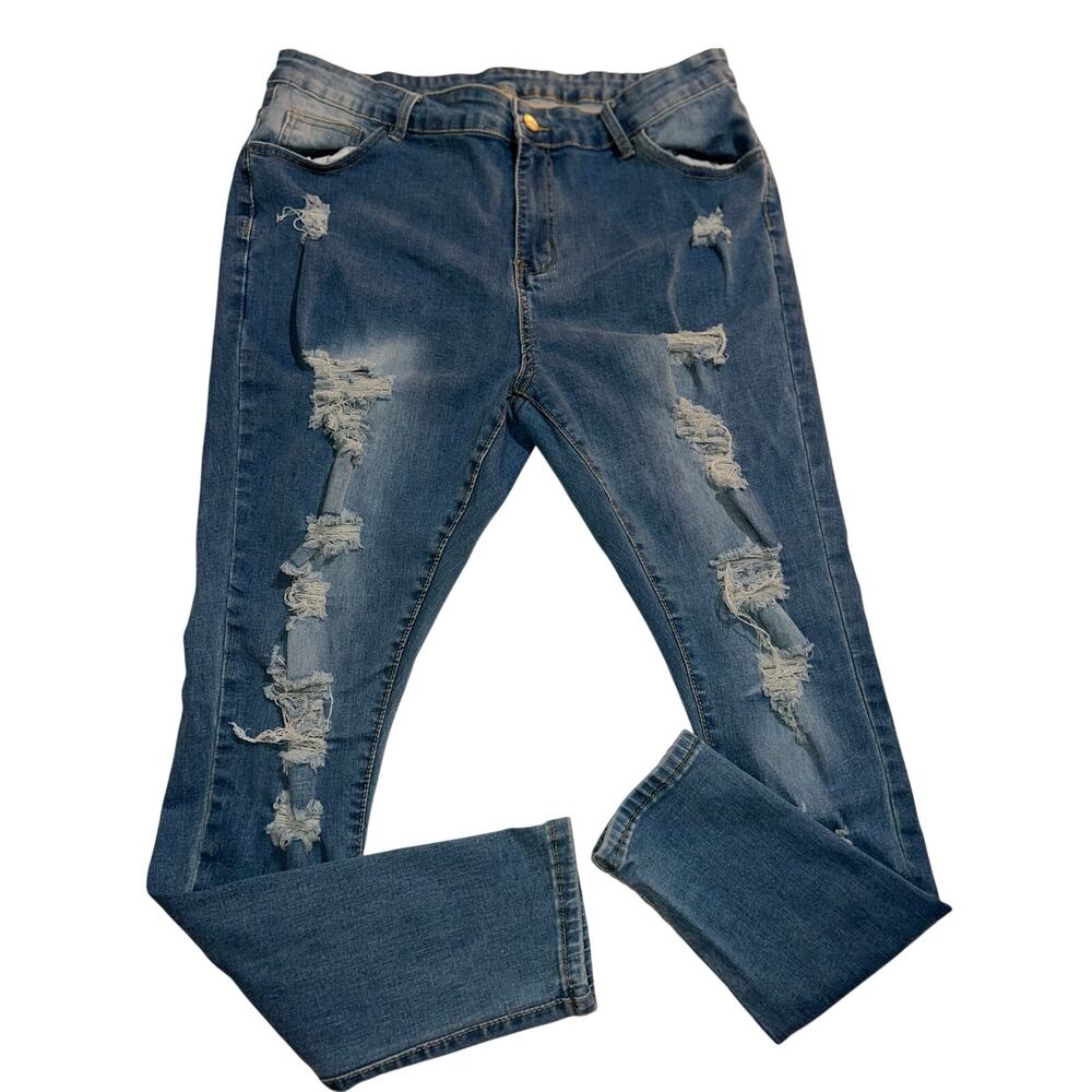 Women’s distressed blue jeans